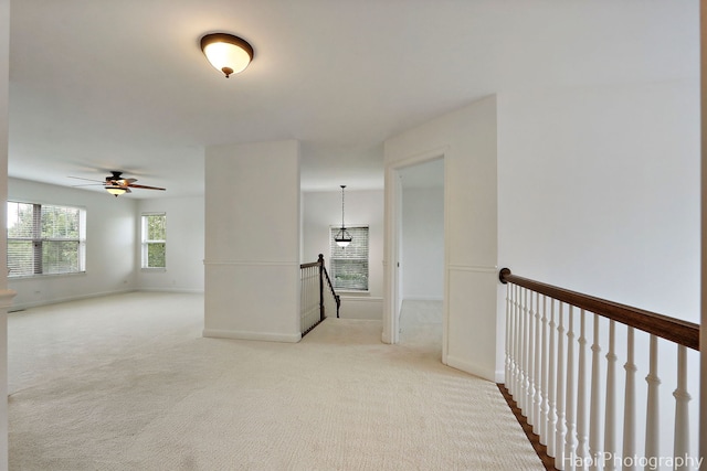 10174 Hopkins St, Huntley, IL 60142 - empty room featuring light carpet and a ceiling fan