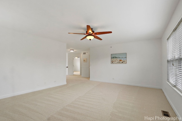 10174 Hopkins St, Huntley, IL 60142 - empty room with a ceiling fan and light carpet