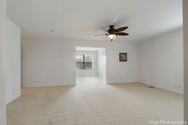 10174 Hopkins St, Huntley, IL 60142 - carpeted spare room featuring a ceiling fan and baseboards