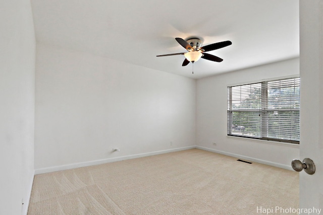 10174 Hopkins St, Huntley, IL 60142 - empty room with a ceiling fan and carpet flooring