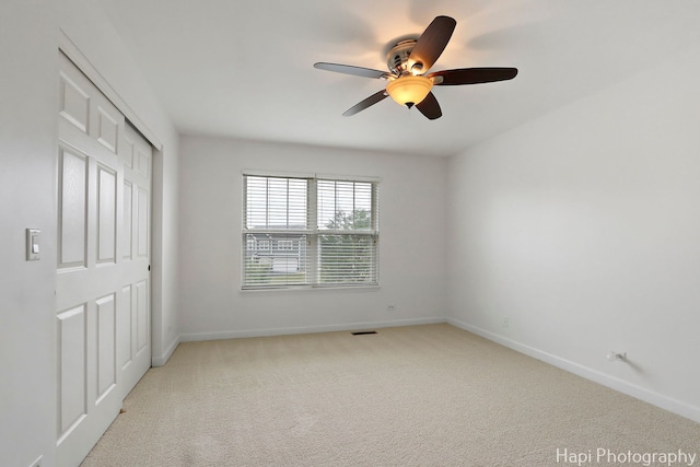 10174 Hopkins St, Huntley, IL 60142 - unfurnished bedroom featuring carpet flooring, a closet, and a ceiling fan