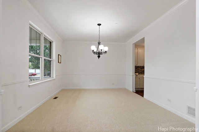 10174 Hopkins St, Huntley, IL 60142 - carpeted spare room with a chandelier and crown molding
