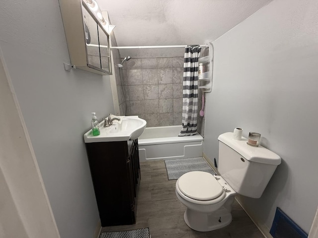 1250 Corbin St, Rockford, IL 61102 - full bath featuring shower / bath combination with curtain, vanity, and wood finished floors