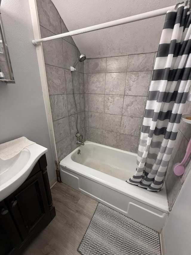 1250 Corbin St, Rockford, IL 61102 - bathroom with shower / tub combo with curtain, wood finished floors, and vanity