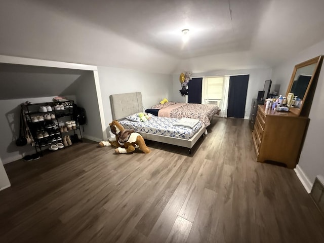 1250 Corbin St, Rockford, IL 61102 - bedroom featuring wood finished floors and vaulted ceiling