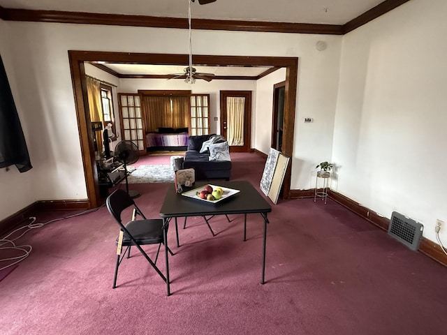 1250 Corbin St, Rockford, IL 61102 - carpeted dining area with ornamental molding and ceiling fan