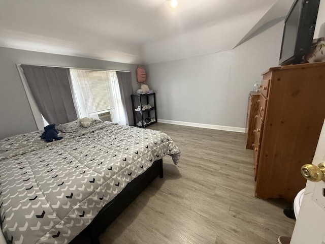 1250 Corbin St, Rockford, IL 61102 - bedroom featuring wood finished floors and lofted ceiling