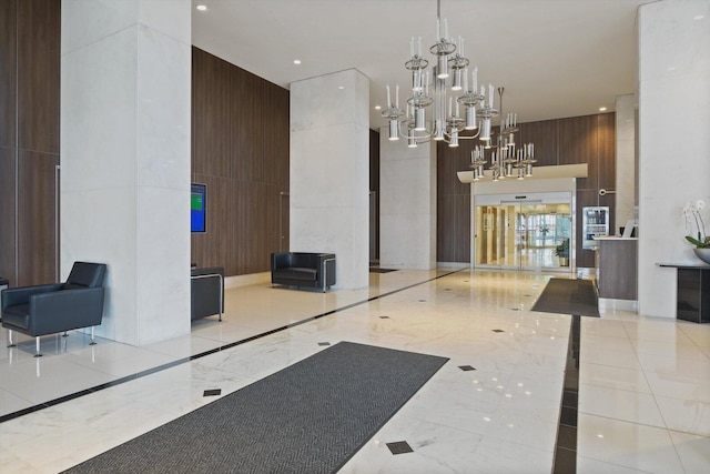 1550 N Lake Shore Dr Unit 2A, Chicago, IL 60610 - lobby with a high ceiling, recessed lighting, and wooden walls