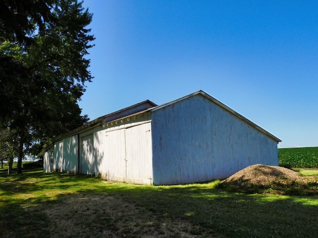 4256 W Egan Rd, Leaf River, IL 61047 - view of pole building featuring a yard