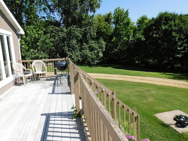 4256 W Egan Rd, Leaf River, IL 61047 - wooden terrace featuring a lawn