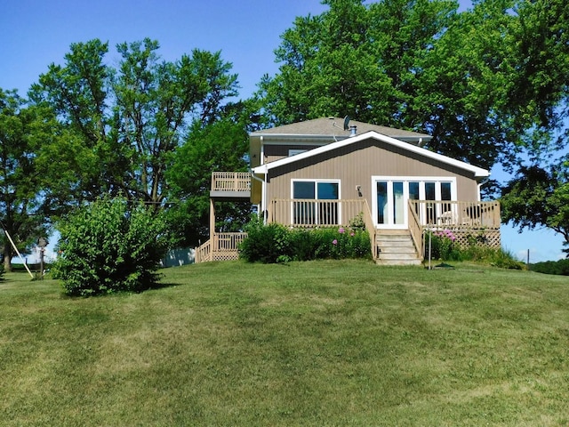 4256 W Egan Rd, Leaf River, IL 61047 - view of front of house with a deck and a front lawn