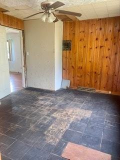 26158 W Reed St, Ingleside, IL 60041 - unfurnished room with wooden walls and a ceiling fan