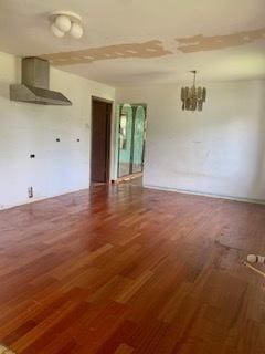 26158 W Reed St, Ingleside, IL 60041 - spare room featuring wood finished floors and a chandelier