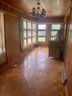 26158 W Reed St, Ingleside, IL 60041 - unfurnished sunroom with a chandelier