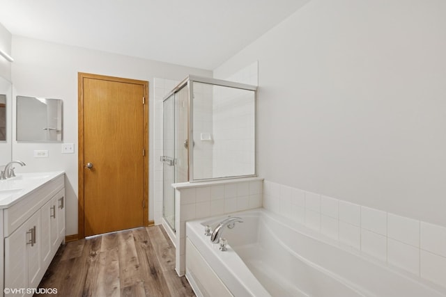 133 Springbrook Trl S, Oswego, IL 60543 - full bath with vanity, a garden tub, a shower stall, and wood finished floors