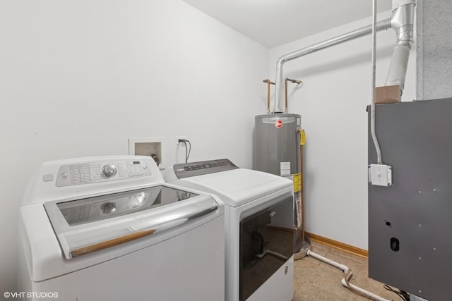 133 Springbrook Trl S, Oswego, IL 60543 - washroom with water heater, washer and clothes dryer, and light tile patterned floors