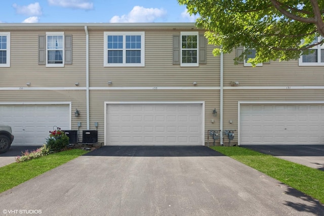 133 Springbrook Trl S, Oswego, IL 60543 - view of front of home with an attached garage and driveway