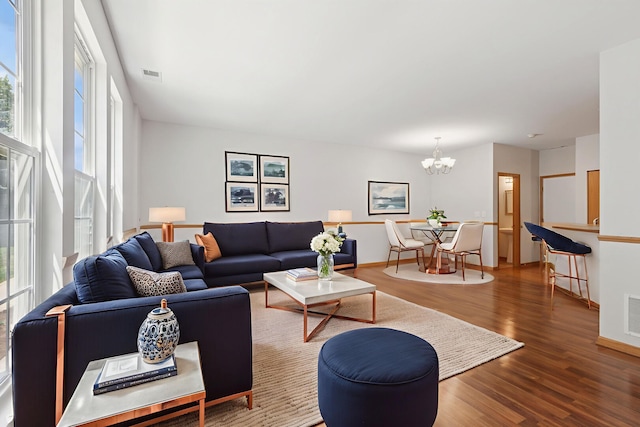 133 Springbrook Trl S, Oswego, IL 60543 - living room with wood finished floors and a chandelier