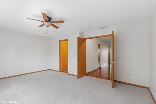 133 Springbrook Trl S, Oswego, IL 60543 - unfurnished room featuring a ceiling fan, carpet floors, and a smoke detector
