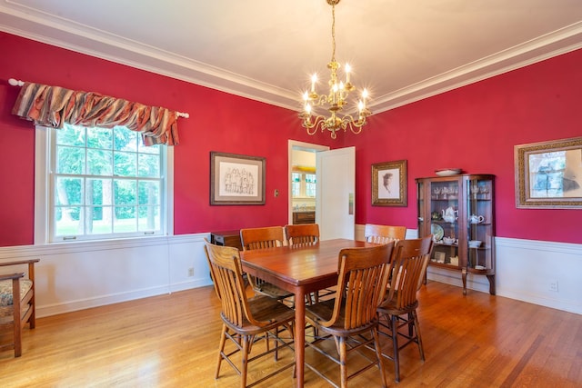 1286 W Stephenson St, Freeport, IL 61032 - dining space featuring a chandelier, wood finished floors, and ornamental molding