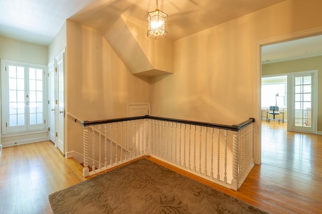 1286 W Stephenson St, Freeport, IL 61032 - hall with an upstairs landing, wood finished floors, and a chandelier