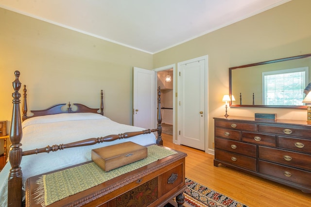 1286 W Stephenson St, Freeport, IL 61032 - bedroom featuring light wood-style floors and ornamental molding