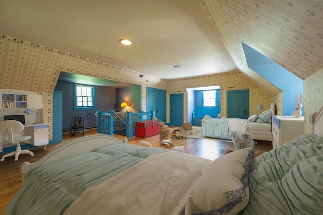 1286 W Stephenson St, Freeport, IL 61032 - bedroom with wallpapered walls, wood finished floors, and multiple windows