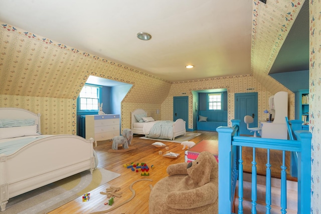 1286 W Stephenson St, Freeport, IL 61032 - bedroom featuring wallpapered walls, wood finished floors, and recessed lighting