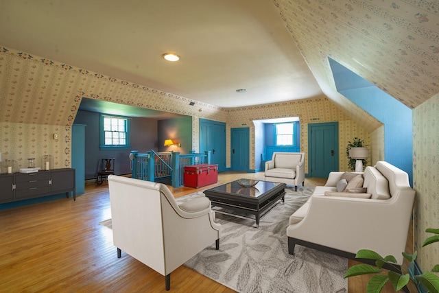 1286 W Stephenson St, Freeport, IL 61032 - living room featuring wallpapered walls, wood finished floors, and healthy amount of natural light