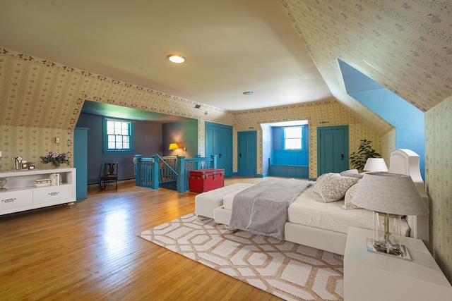 1286 W Stephenson St, Freeport, IL 61032 - bedroom featuring wallpapered walls, wood finished floors, and multiple windows