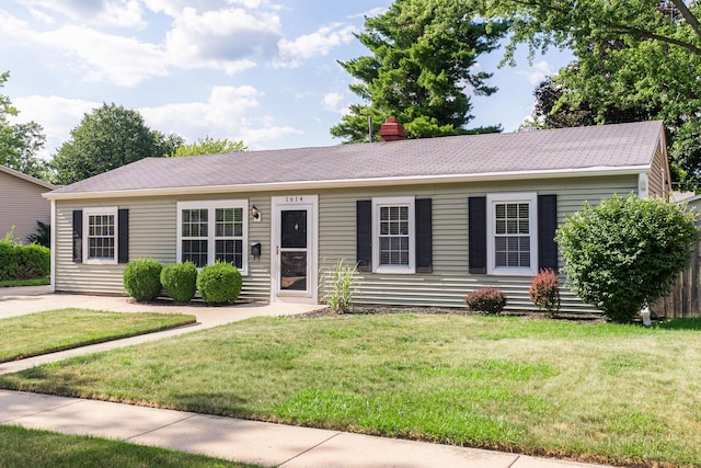 1614 E Dresser Rd, Dekalb, IL 60115 - ranch-style home featuring a front lawn and a chimney