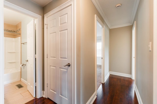 1614 E Dresser Rd, Dekalb, IL 60115 - hall featuring dark wood-type flooring and ornamental molding