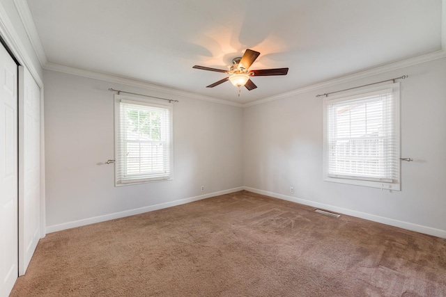 1614 E Dresser Rd, Dekalb, IL 60115 - empty room featuring carpet flooring, ceiling fan, and crown molding