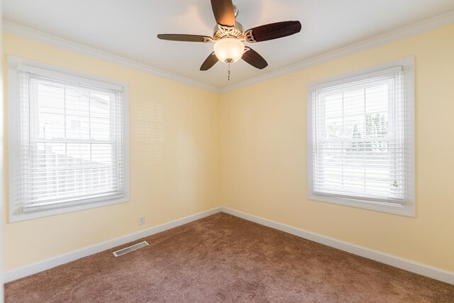 1614 E Dresser Rd, Dekalb, IL 60115 - unfurnished room featuring healthy amount of natural light, carpet, crown molding, and ceiling fan