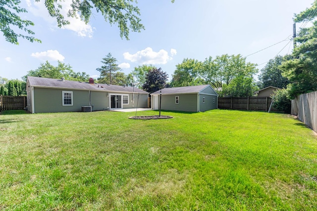 1614 E Dresser Rd, Dekalb, IL 60115 - fenced backyard featuring a patio area