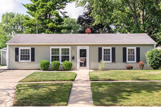1614 E Dresser Rd, Dekalb, IL 60115 - ranch-style home with a front lawn, a chimney, and roof with shingles