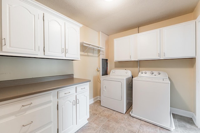 1614 E Dresser Rd, Dekalb, IL 60115 - laundry room with cabinet space, washing machine and clothes dryer, and a textured ceiling