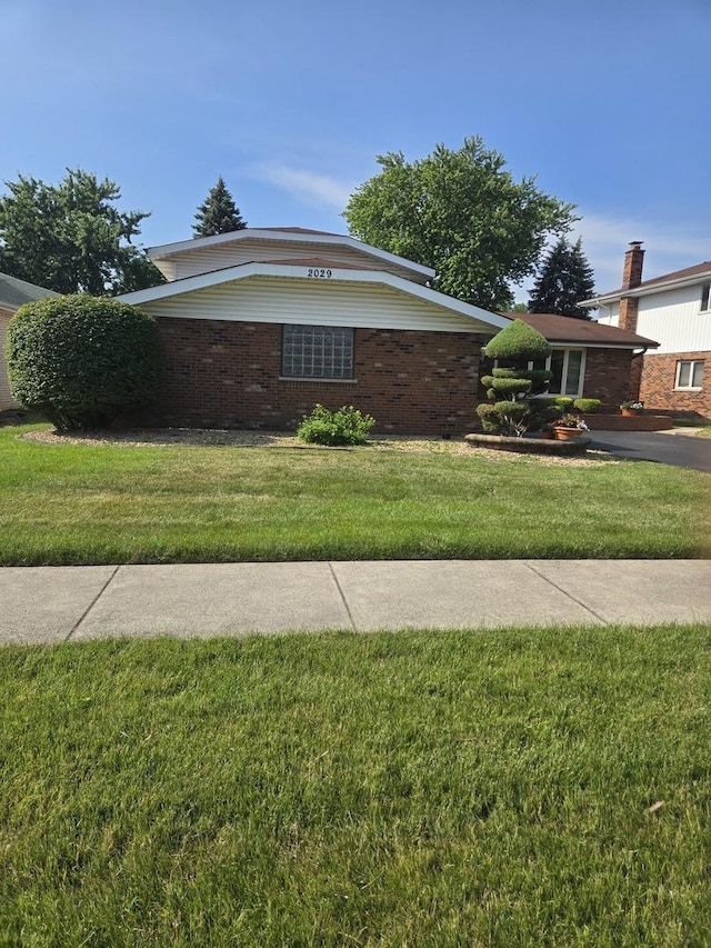 2029 171st Pl, South Holland, IL 60473 - view of front of house with a front lawn and brick siding