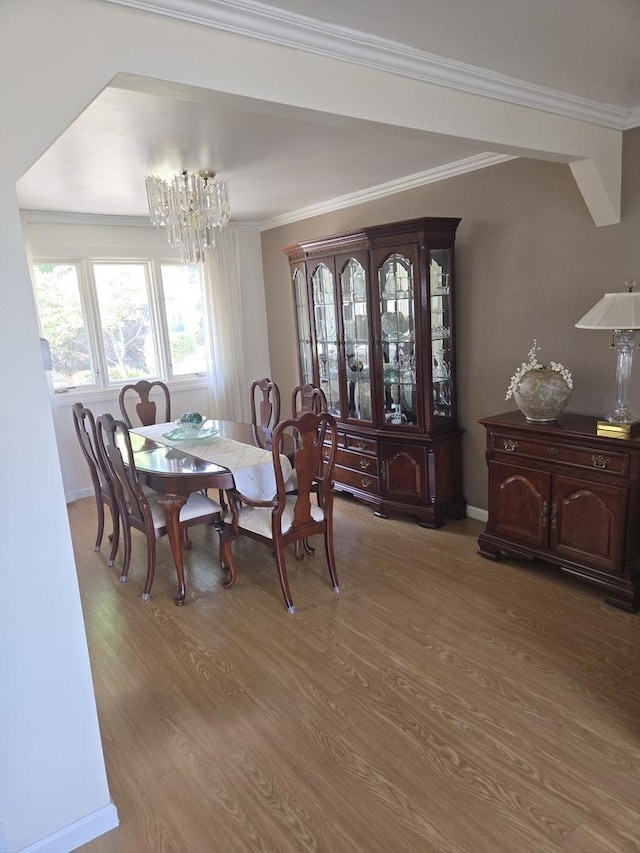 2029 171st Pl, South Holland, IL 60473 - dining room with a chandelier, light wood-style flooring, and ornamental molding