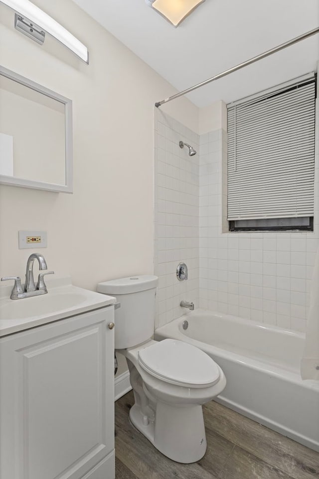 4557 S Michigan Ave Unit 1, Chicago, IL 60615 - bathroom featuring wood finished floors, vanity, and  shower combination