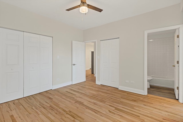 4557 S Michigan Ave Unit 1, Chicago, IL 60615 - unfurnished bedroom with light wood-type flooring, ensuite bath, and a ceiling fan