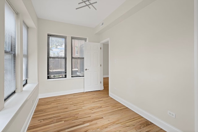 4557 S Michigan Ave Unit 1, Chicago, IL 60615 - spare room featuring light wood-type flooring and baseboards