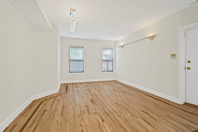 4557 S Michigan Ave Unit 1, Chicago, IL 60615 - empty room with light wood-style flooring and baseboards