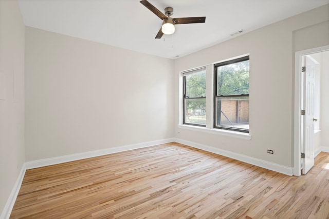 4557 S Michigan Ave Unit 1, Chicago, IL 60615 - unfurnished room featuring light wood-style flooring and a ceiling fan
