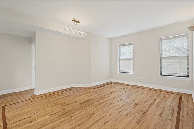 4557 S Michigan Ave Unit 1, Chicago, IL 60615 - empty room with light wood-style floors and baseboards
