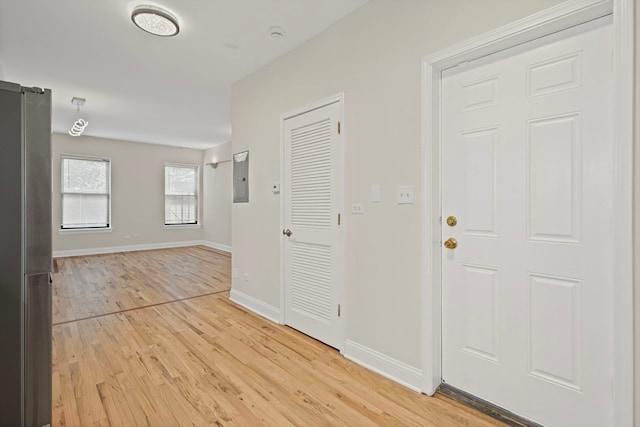 4557 S Michigan Ave Unit 1, Chicago, IL 60615 - hallway featuring light wood-style floors and electric panel