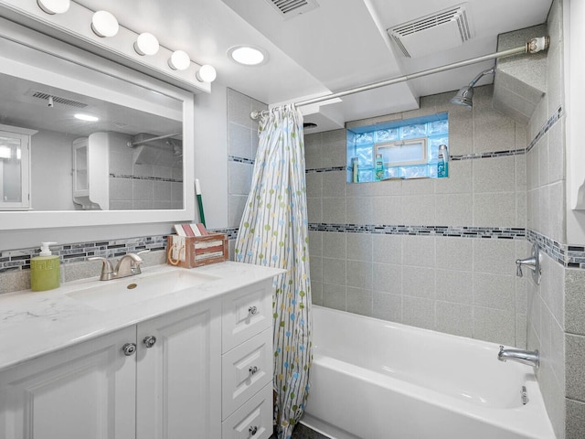 385 E Irving Park Rd, Streamwood, IL 60107 - full bath featuring shower / tub combo, vanity, and backsplash