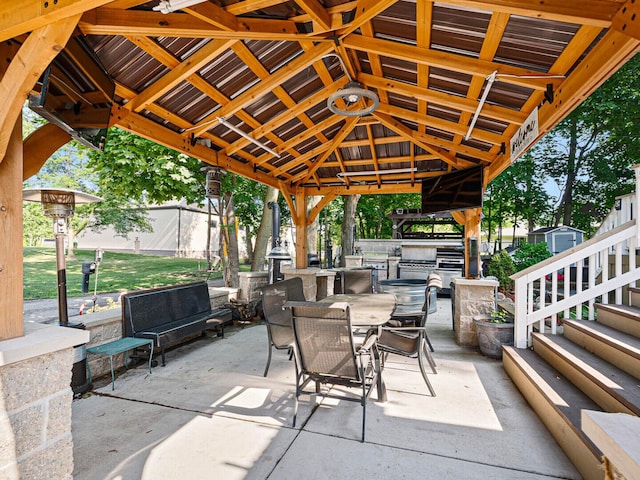 385 E Irving Park Rd, Streamwood, IL 60107 - view of patio featuring a gazebo, outdoor dining area, and area for grilling