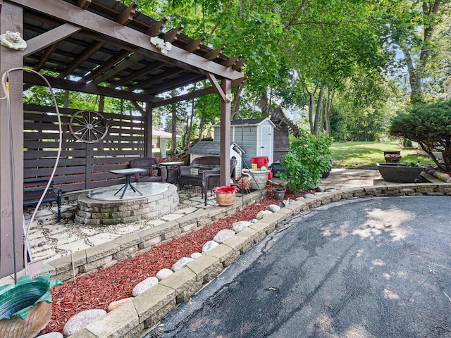 385 E Irving Park Rd, Streamwood, IL 60107 - view of patio with a shed