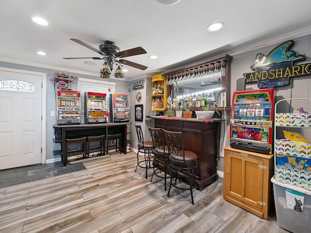 385 E Irving Park Rd, Streamwood, IL 60107 - indoor dry bar featuring ornamental molding, a ceiling fan, light wood-style flooring, and recessed lighting